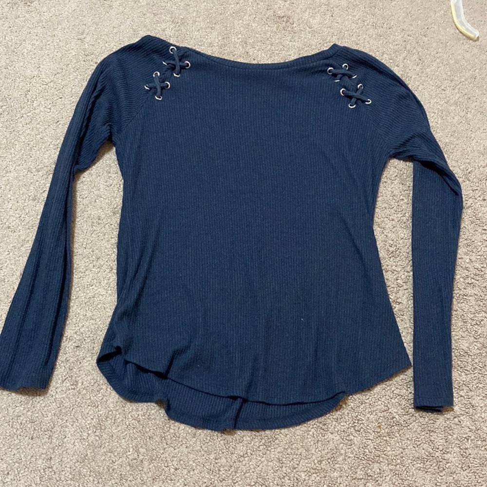 Beautiful knit sweater with cross crochets on the side